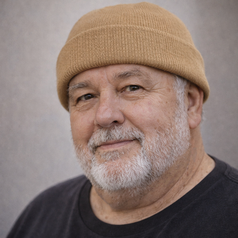 Man wearing a mustard beanie, promoting All Products collection