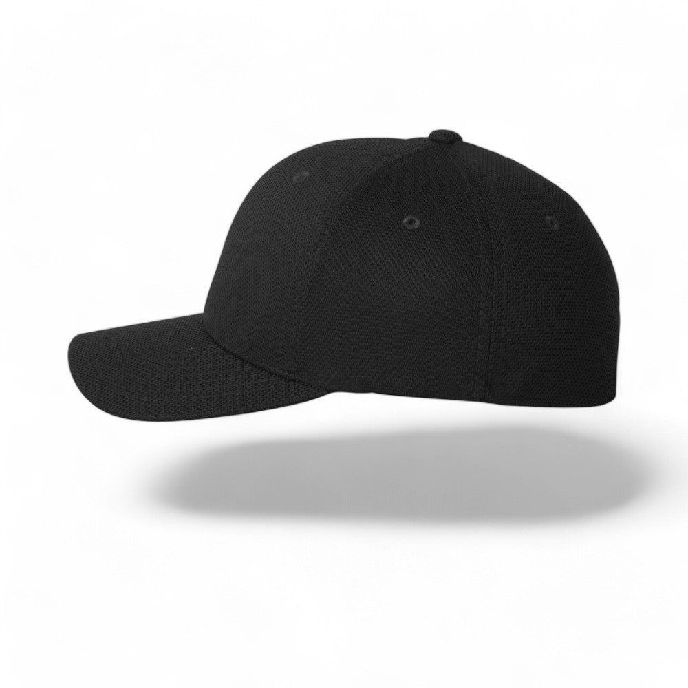 Flexfit baseball cap, black stretch wicking fabric with extra deep crown, left profile view on white background.