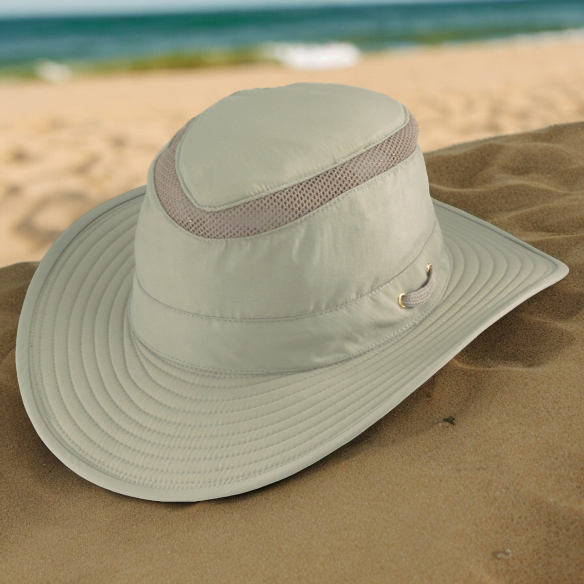 Lightweight Mesh Explorer Hat top view at beach